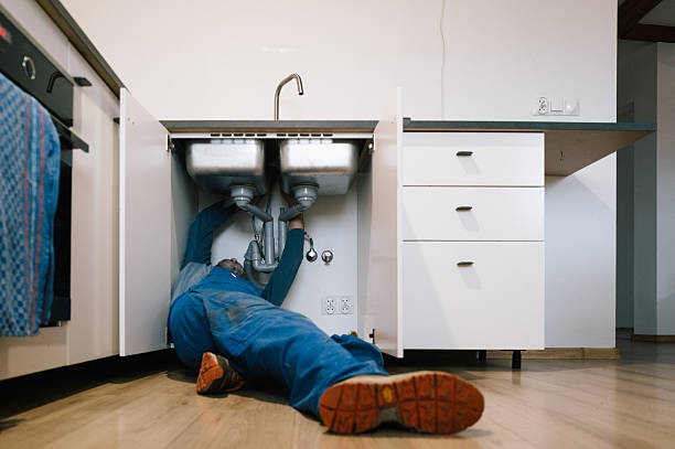 Professional Drain Cleaning technician working in Langston, OK